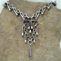 horseshoe nail chandelier necklace