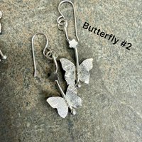 Sterling textured butterfly earrings with tiny flower accent, version #2.