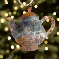 Copper Tea Kettle Ornament on blurred twinkle lights background
