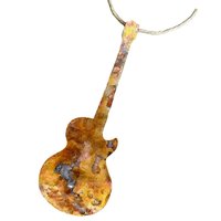 Copper electric guitar ornament on white background