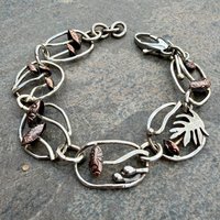 Mixed metal mushroom bracelet, main photo.