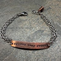 Protect Your Peace mixed metal bracelet, close up view