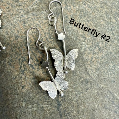 Sterling textured butterfly earrings with tiny flower accent, version #2.