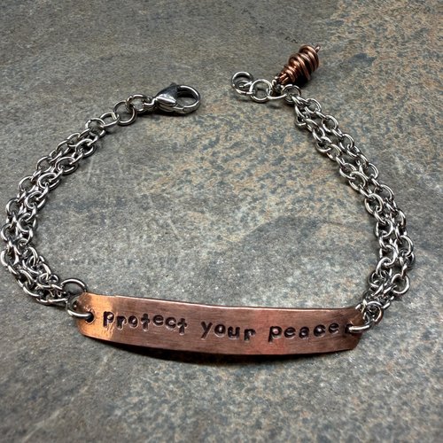 Protect Your Peace mixed metal bracelet, close up view